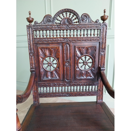 462 - 19th C. carved oak throne chair in the Tudor style {140 cm H x 80 cm W x 52 cm D}.