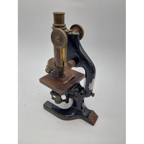 468 - Early 20th C. brass and metal microscope {36 cm H x 11 cm W x 19 cm D}.