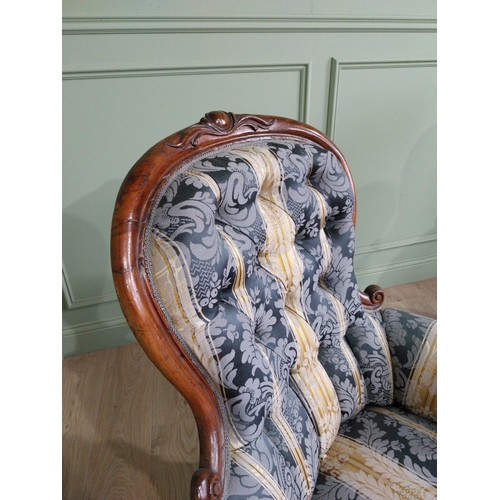 472 - Two Victorian mahogany and upholstered ladies and gents arm chairs raised on cabriole legs {100 cm H... 