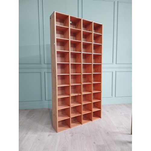 475 - Pine bank of pigeon holes {214 cm H x 112 cm W x 24 cm D}.