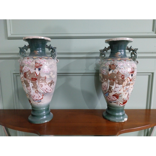 477 - Pair of 19th C. oriental ceramic vases. {47 cm H x 23 cm Dia.}.