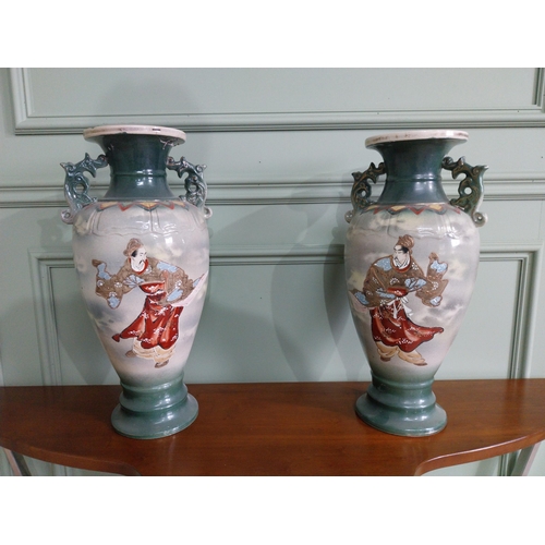 477 - Pair of 19th C. oriental ceramic vases. {47 cm H x 23 cm Dia.}.