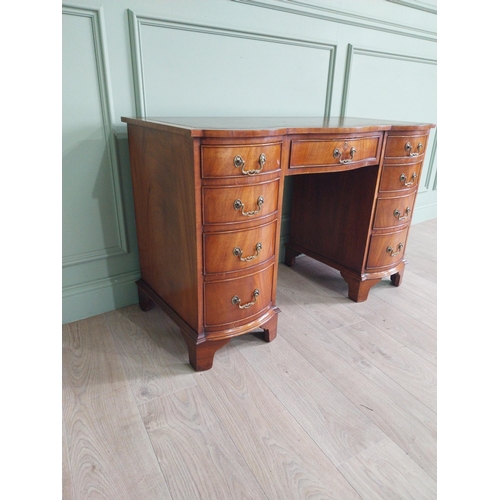 479 - Good quality mahogany knee hole desk with eight short drawers and one long drawer in frieze raised o... 