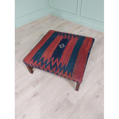 48 - Good quality mahogany centre stool with Kiln rug upholstered seat raised on square legs in the Georg... 