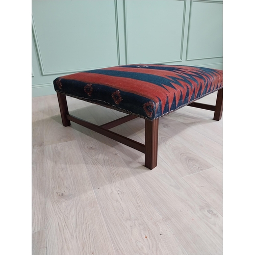 48 - Good quality mahogany centre stool with Kiln rug upholstered seat raised on square legs in the Georg... 