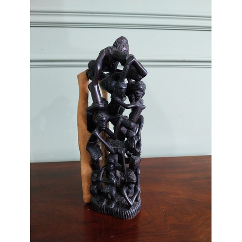 481 - African carved hardwood sculpture 'The Climbing men' {35 cm H x 13 cm W x 13 cm D}.