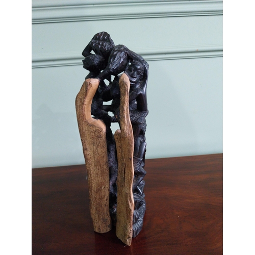481 - African carved hardwood sculpture 'The Climbing men' {35 cm H x 13 cm W x 13 cm D}.