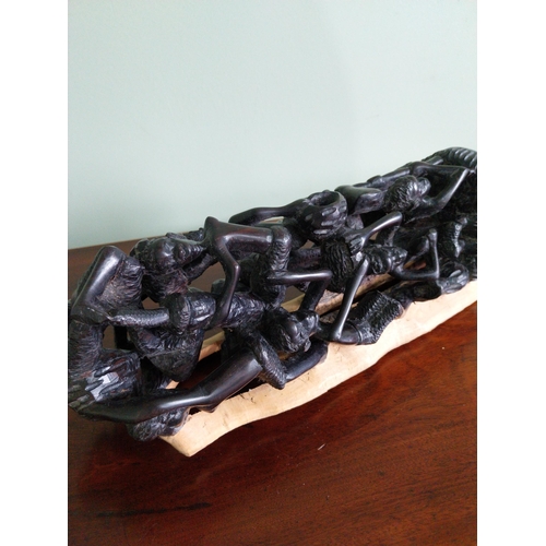 481 - African carved hardwood sculpture 'The Climbing men' {35 cm H x 13 cm W x 13 cm D}.