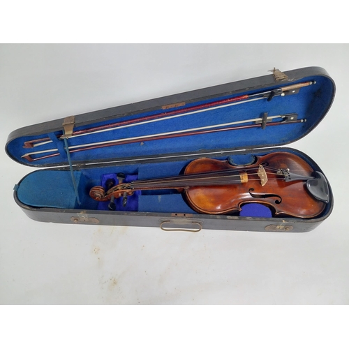 518 - Violin in case with label inside Nicholas Amati Fecit Creamona 1776. 59cm L x 20cm W at bottom x 4cm... 