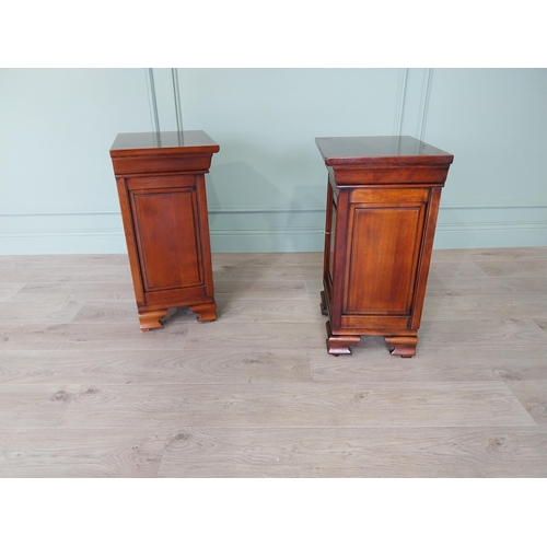 54 - Pair of good quality cherrywood bedside lockers with single drawer above single blind door raised on... 