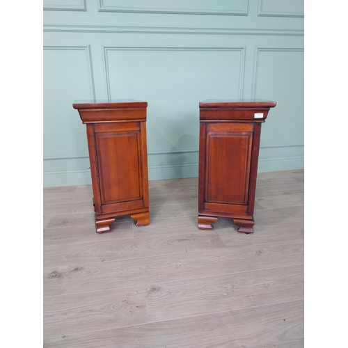 54 - Pair of good quality cherrywood bedside lockers with single drawer above single blind door raised on... 