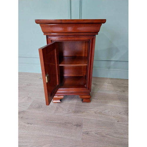 54 - Pair of good quality cherrywood bedside lockers with single drawer above single blind door raised on... 