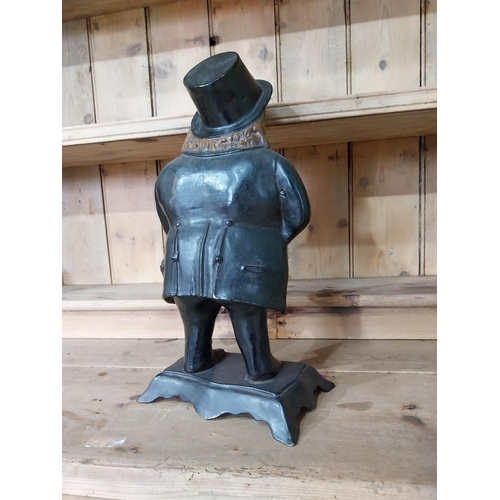 556 - John Bull cast iron painted mantle clock {43 cm H x 22 cm x 16 cm D}.