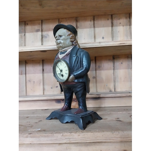 556 - John Bull cast iron painted mantle clock {43 cm H x 22 cm x 16 cm D}.