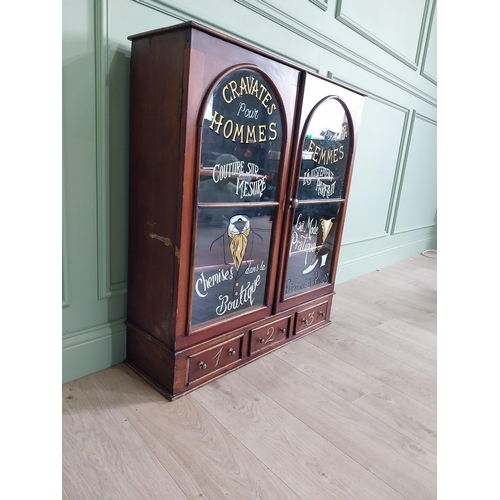 56 - Mahogany tailors glass cabinet with two glazed doors over three drawers {95 cm H x 86 cm W x 26 cm D... 