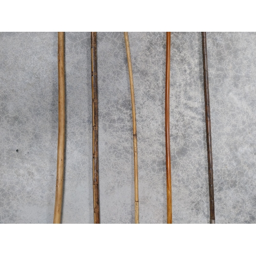 61 - Collection of five early 20th C. walking sticks.