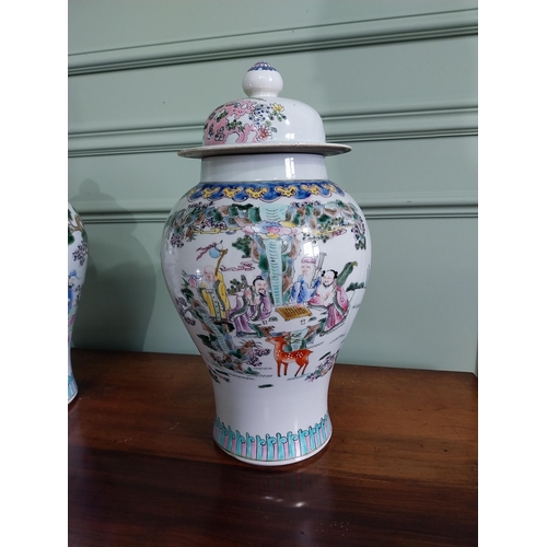 73 - Pair of decorative Oriental ceramic lidded urns {42 cm H x 22 cm Dia.}.