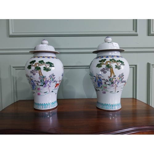 73 - Pair of decorative Oriental ceramic lidded urns {42 cm H x 22 cm Dia.}.