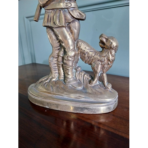 78 - Good quality Edwardian brass door stop depicting man and dog {36 cm H x 23 cm W x 8 cm D}.