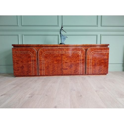 8 - Italian walnut credenza with brass trim in the Art Deco style. {77 cm H x 225 cm W x 47 cm D}.