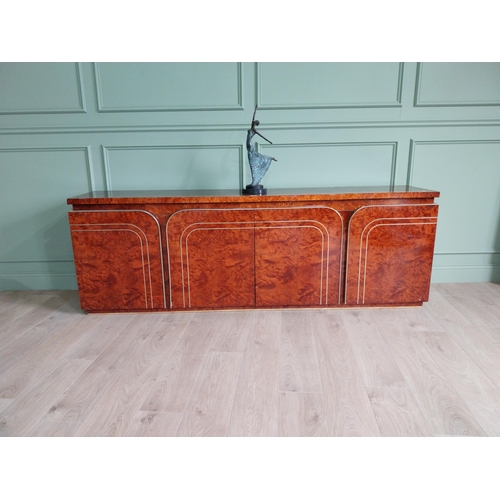 8 - Italian walnut credenza with brass trim in the Art Deco style. {77 cm H x 225 cm W x 47 cm D}.