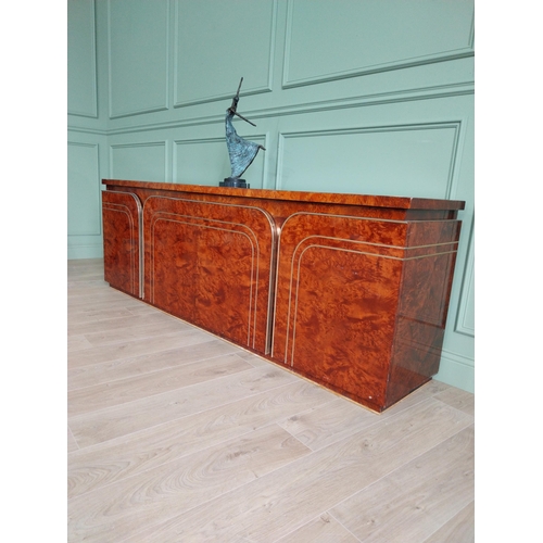 8 - Italian walnut credenza with brass trim in the Art Deco style. {77 cm H x 225 cm W x 47 cm D}.