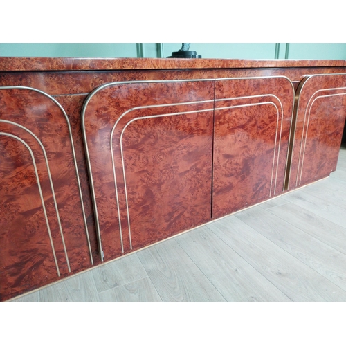 8 - Italian walnut credenza with brass trim in the Art Deco style. {77 cm H x 225 cm W x 47 cm D}.