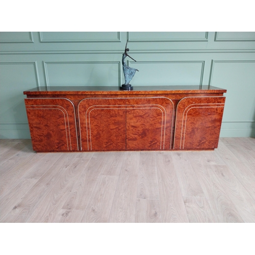 8 - Italian walnut credenza with brass trim in the Art Deco style. {77 cm H x 225 cm W x 47 cm D}.