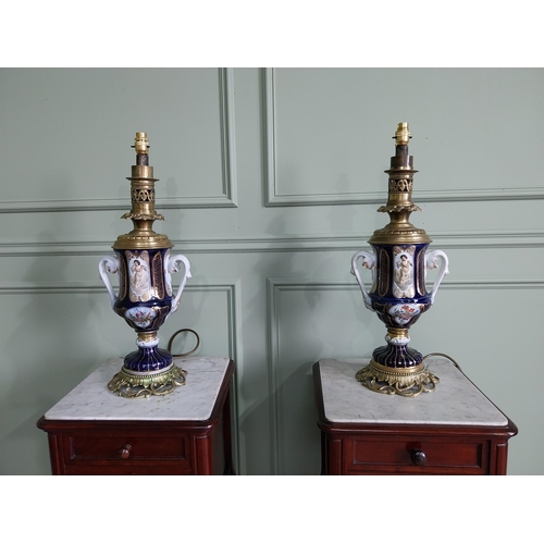 82 - Pair of good quality 19th C. French hand painted ceramic and brass table lamps {62 cm H x 20 cm Dia.... 