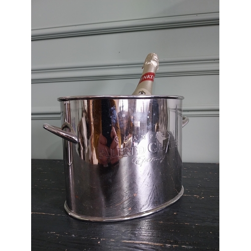 87 - Good quality silver plated champagne bucket {18 cm H x 28 cm W x 16 cm D}.