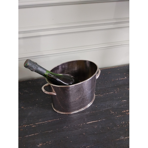 88 - Good quality silver plated champagne bucket {18 cm H x 28 cm W x 16 cm D}.