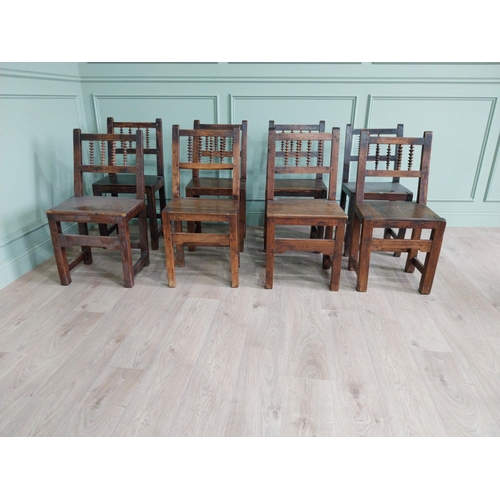 906 - Set of nine early 19th C. oak kitchen chairs raised on square legs {90 cm H x 42 cm W x 42 cm D}.