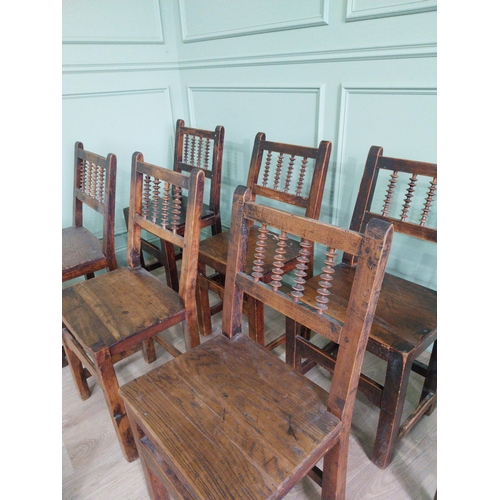 906 - Set of nine early 19th C. oak kitchen chairs raised on square legs {90 cm H x 42 cm W x 42 cm D}.