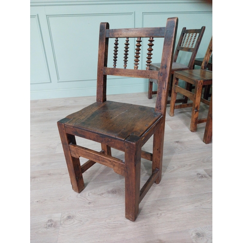 906 - Set of nine early 19th C. oak kitchen chairs raised on square legs {90 cm H x 42 cm W x 42 cm D}.