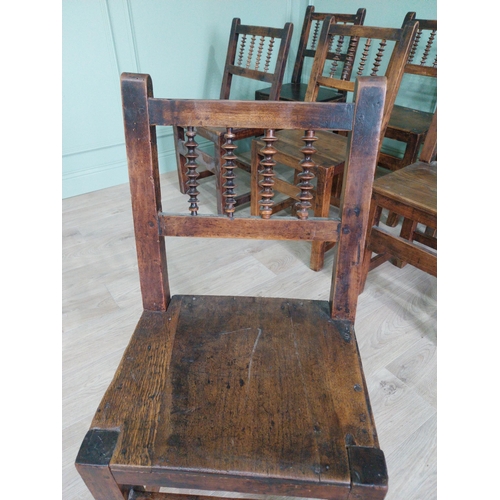 906 - Set of nine early 19th C. oak kitchen chairs raised on square legs {90 cm H x 42 cm W x 42 cm D}.