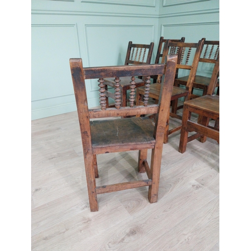 906 - Set of nine early 19th C. oak kitchen chairs raised on square legs {90 cm H x 42 cm W x 42 cm D}.