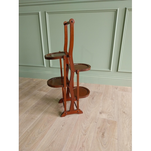 96 - Edwardian mahogany folding cake stand {90 cm H x 27 cm W x 43 cm D}. U