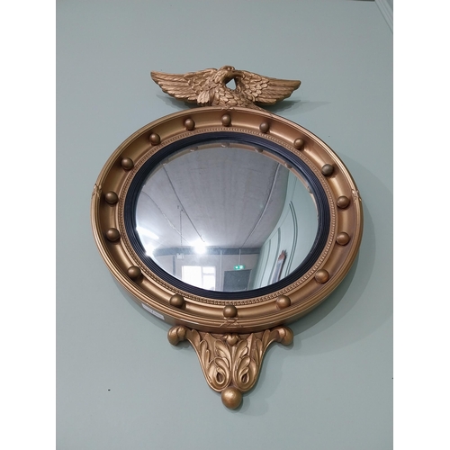 97 - Gilt convex mirror in the Regency style {70 cm H x 47 cm Dia.}.