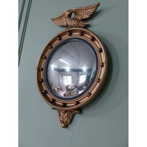 97 - Gilt convex mirror in the Regency style {70 cm H x 47 cm Dia.}.