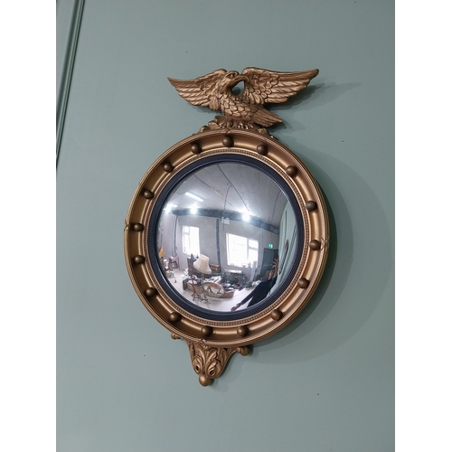 97 - Gilt convex mirror in the Regency style {70 cm H x 47 cm Dia.}.