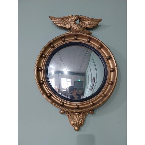 97 - Gilt convex mirror in the Regency style {70 cm H x 47 cm Dia.}.