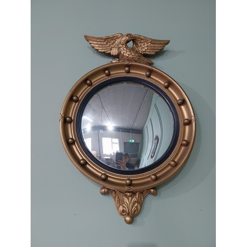 97 - Gilt convex mirror in the Regency style {70 cm H x 47 cm Dia.}.