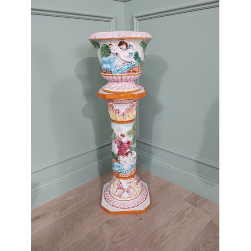 58 - Decorative hand painted ceramic jardini�re on stand on the Majolica style {94 cm H x 30 cm W x 30 cm... 