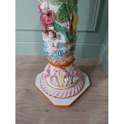 58 - Decorative hand painted ceramic jardini�re on stand on the Majolica style {94 cm H x 30 cm W x 30 cm... 