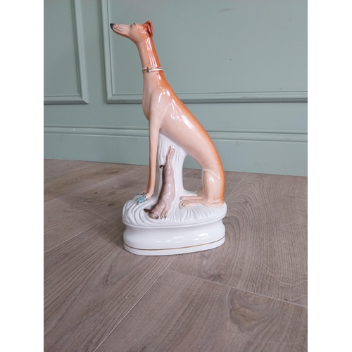 453 - 19th C. Staffordshire figure of a Whippet {33 cm H x 17 cm W x 9 cm D}.