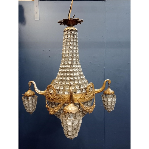 115 - Brass and glass four branch chandelier {H 60cm x D 60cm }. - NOT AVAILABLE TO VIEW IN PERSON