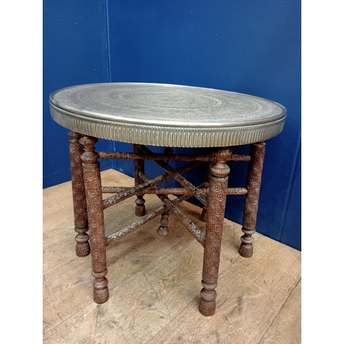 72 - Brass and wood Anglo, Indian, Arabic carved folding end table {H 500cm x Dia 60cm }. - NOT AVAILABLE... 