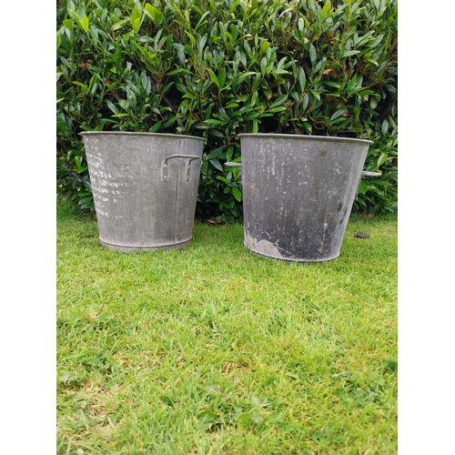 1116 - Pair of early 20th C. galvanised planters {39 cm H x 43 cm Dia.}.