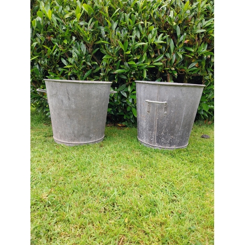 1116 - Pair of early 20th C. galvanised planters {39 cm H x 43 cm Dia.}.