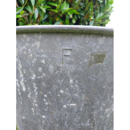 1116 - Pair of early 20th C. galvanised planters {39 cm H x 43 cm Dia.}.